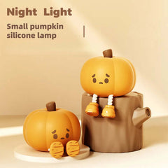Cute small pumpkin silicone lamp night light for Halloween decor, safe BPA-free material, perfect for kids' rooms.
