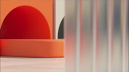 Abstract composition featuring colorful shapes in orange, red, and black against a blurred background.