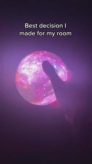 Colorful 3D printing moon light glowing with a hand touching it, perfect for room decor.