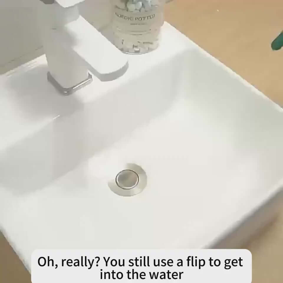 Modern wash basin with drainer and strainer, highlighting a sleek design and functional features.