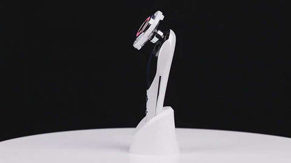7-in-1 facial massager with LED light and vibration features on a white stand for skin care.