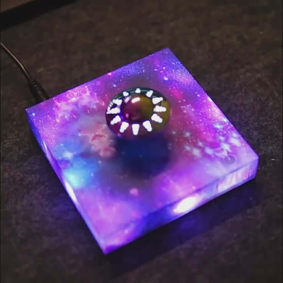 Levitating UFO Color Galaxy Lamp with vibrant color changing lights and a Milky Way galaxy base, creating a cosmic ambiance.