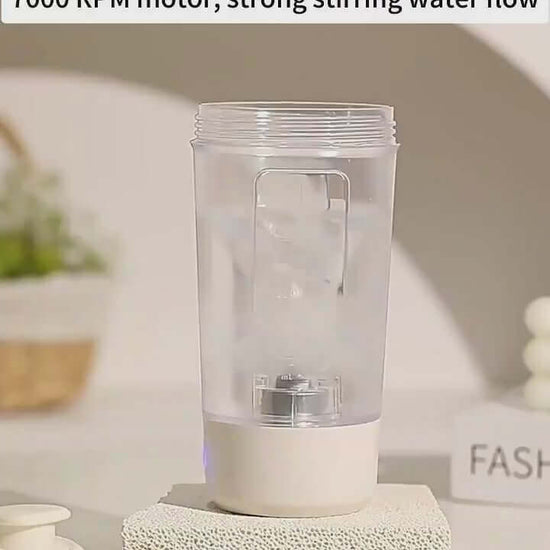 7000 RPM electric shaker bottle showing strong stirring flow for smooth mixing in a stylish setting.