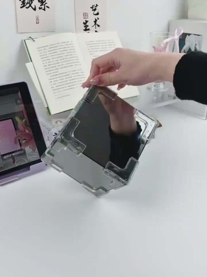 Hand holding a transparent DIY material pack for creating a tulip night light, showcasing its sleek design and functionality.